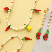Set di ispirazione Idee creative con i ciondoli di vetro alla frutta per le più belle parure di gioielli