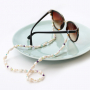 Accessori estivi da realizzare con cordoncino macram&egrave;, perle d&rsquo;acqua dolce e perline a forma di conchiglia: