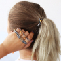 Crea simpatici elastici per capelli e braccialetti con nastro elastico cucito con stampa leopardo