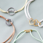 Realizzare gioielli must have con distanziatori in acciaio inox e cordoncino di raso colorato  