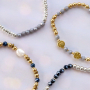 Puoi usare queste perline sfaccettate rotonde per una bella collezione di bracciali