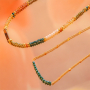 Set gioielli con perline sfaccettate a disco
