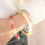 Bracciali con fiori secchi e fermagli per capelli abbinati