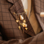 Consigli per la creazione di spille decorative con occhielli